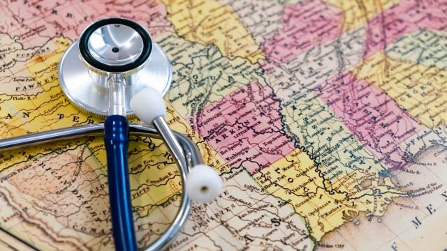 Stethoscope lying on a map of the United States