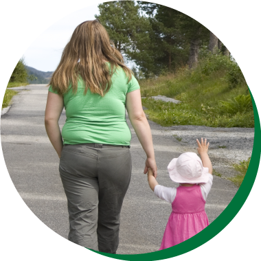 Woman walking with young child