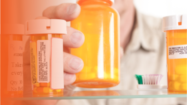 Orange bottles on a shelf