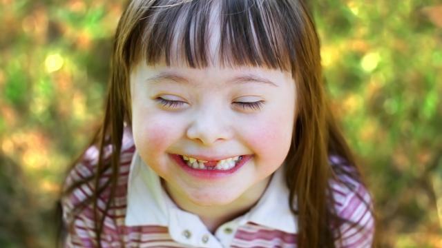 A portrait of a smiling child.