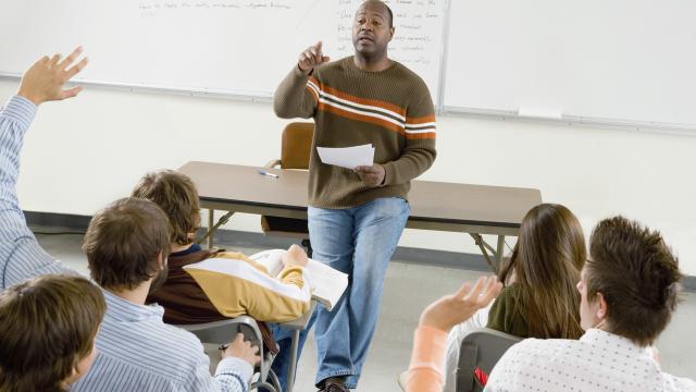 A professor giving a lecture in the classroom at university