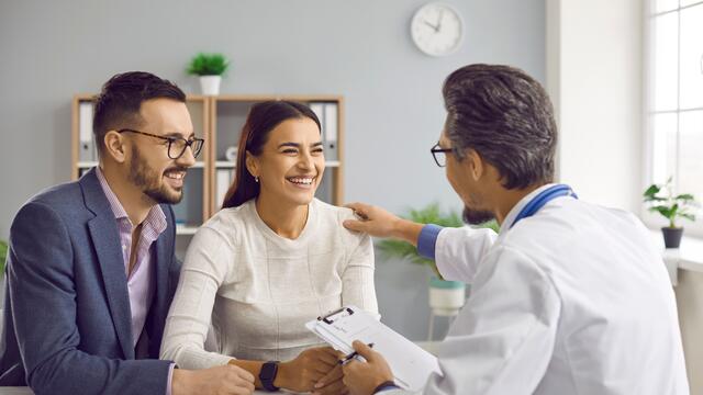 Couple meeting with a doctor for pregnancy planning