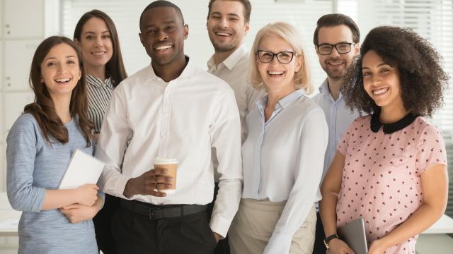 Group of seven adults in an office