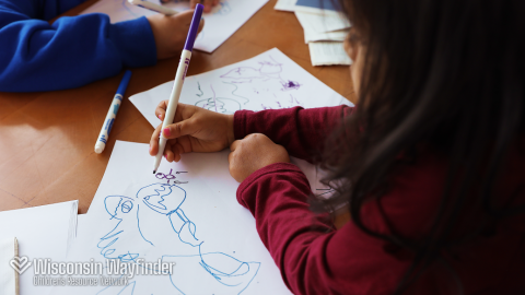 Wisconsin Wayfinder: Child Creating a Drawing With a Marker