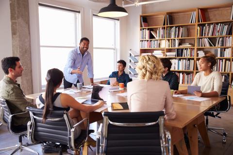 Team meeting around a conference room table