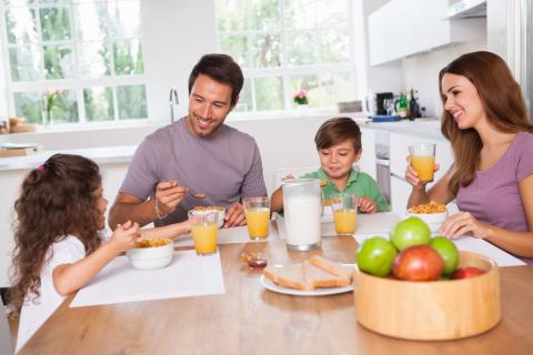 Family eating breakfast in their kitchen