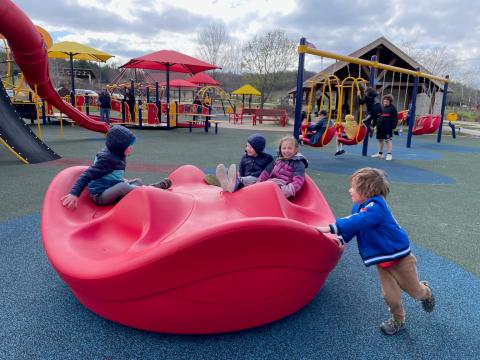 Kids playing on Jackson County all-abilities playground