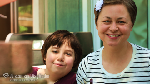 Wisconsin Wayfinder: Parent and Child Smiling