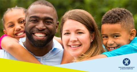 Close up of two adults and two children