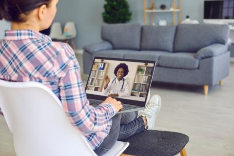 Person having a video visit with a physician