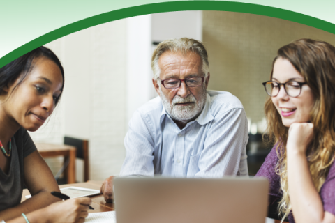 Tobacco Program image of three adults looking at a laptop computer