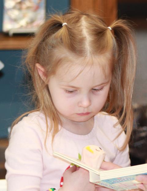 LaCrosse Birth to 3 ARPA Grants 1: Child reading board book