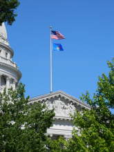 Wisconsin State Capitol with Wisconsin and US Flags flying