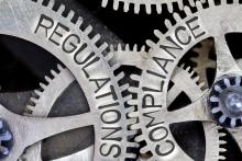 Interlocking gears with imprinted words: Regulations, Compliance