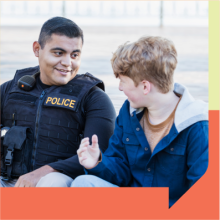 A law enforcement officer with a child