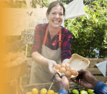 Vendor at a farmers market