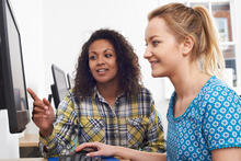 Individual computer training between two adults.