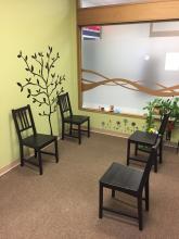 A room with chairs in a women's health clinic