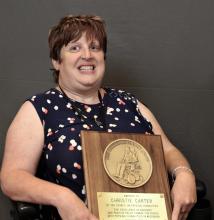 Christie Carter receiving a 2023 Dan Johnson Advocacy Award Recipient