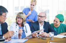 Medical personnel at a meeting