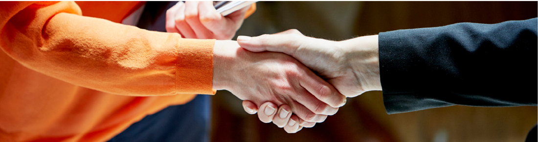 Two people shaking hands